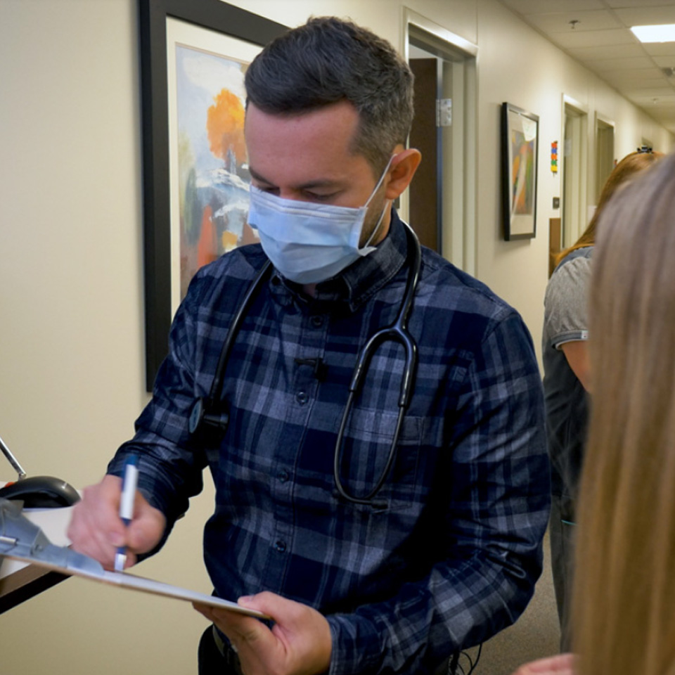 Dr. Korkor working in his office