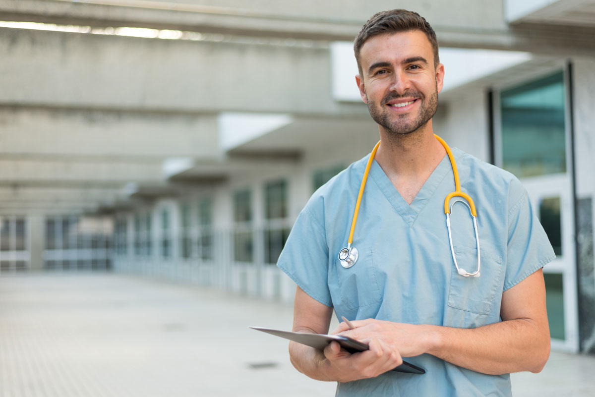 Male nurse with a clipboard