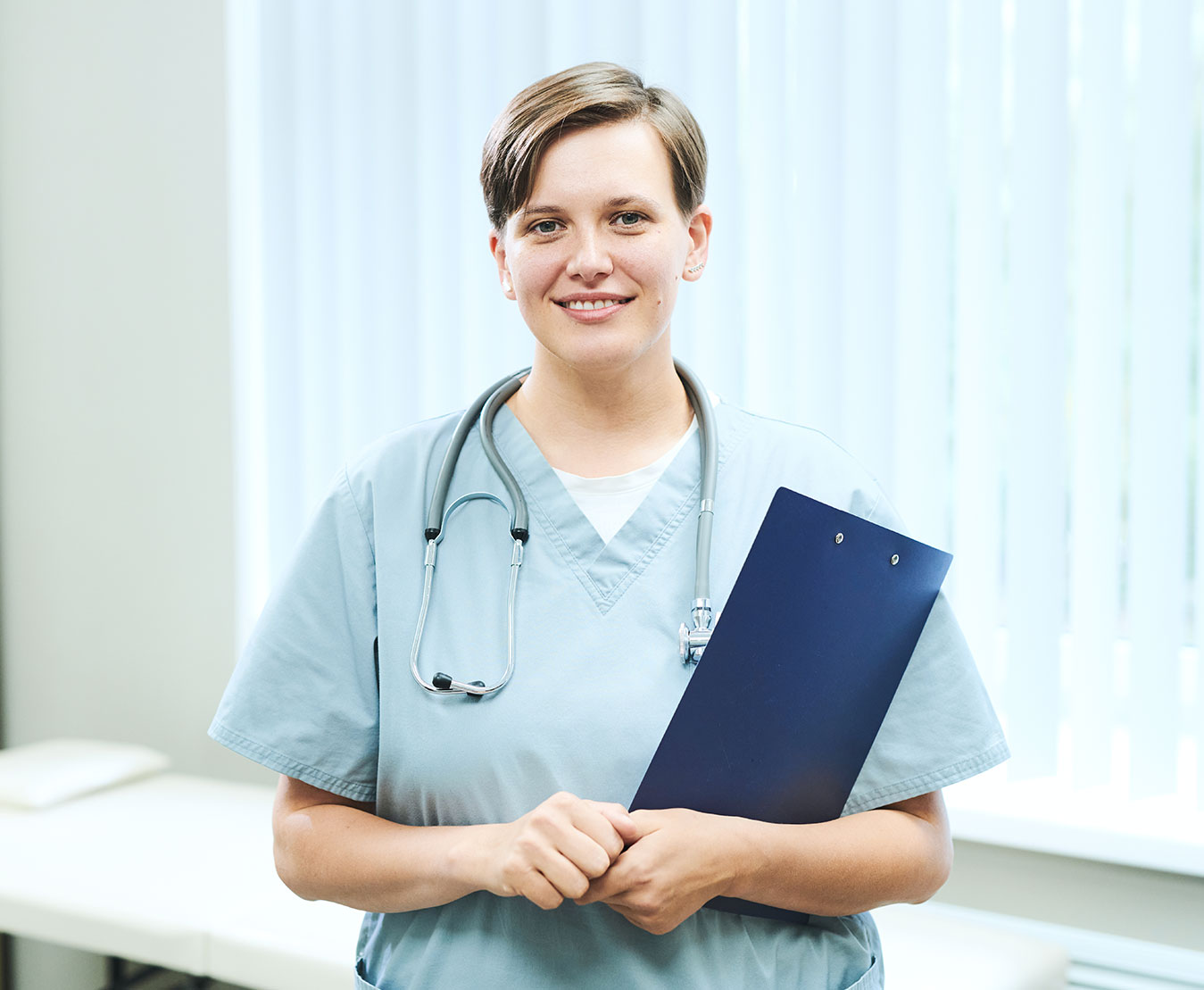 portrait of smiling young female nurse